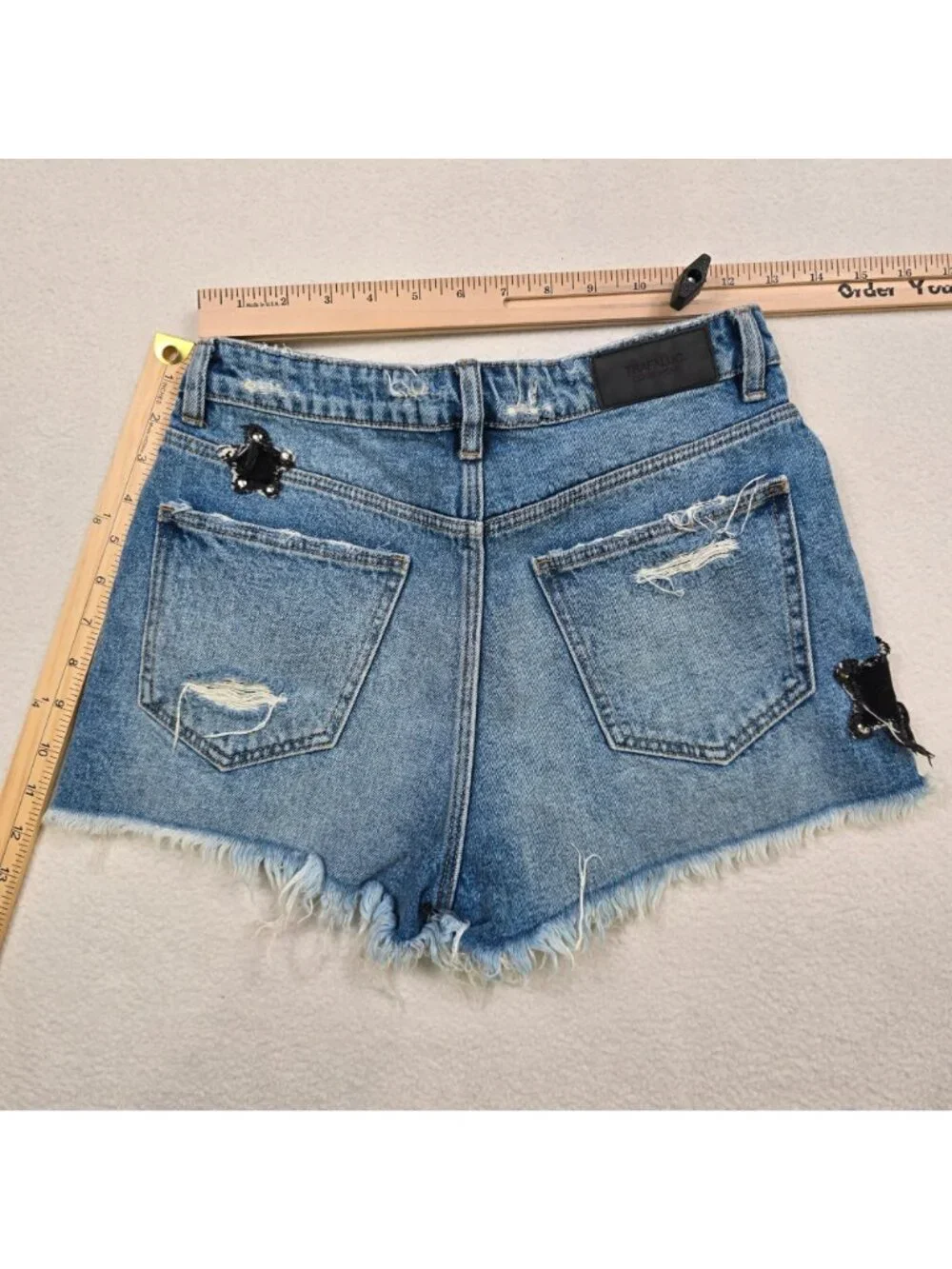 Zara Trafaluc Womens Size 4 Distressed Denim Shorts Star Patches Blue Raw Hem - Picture 3 of 3